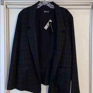 Brand new patterned blazer with tags.